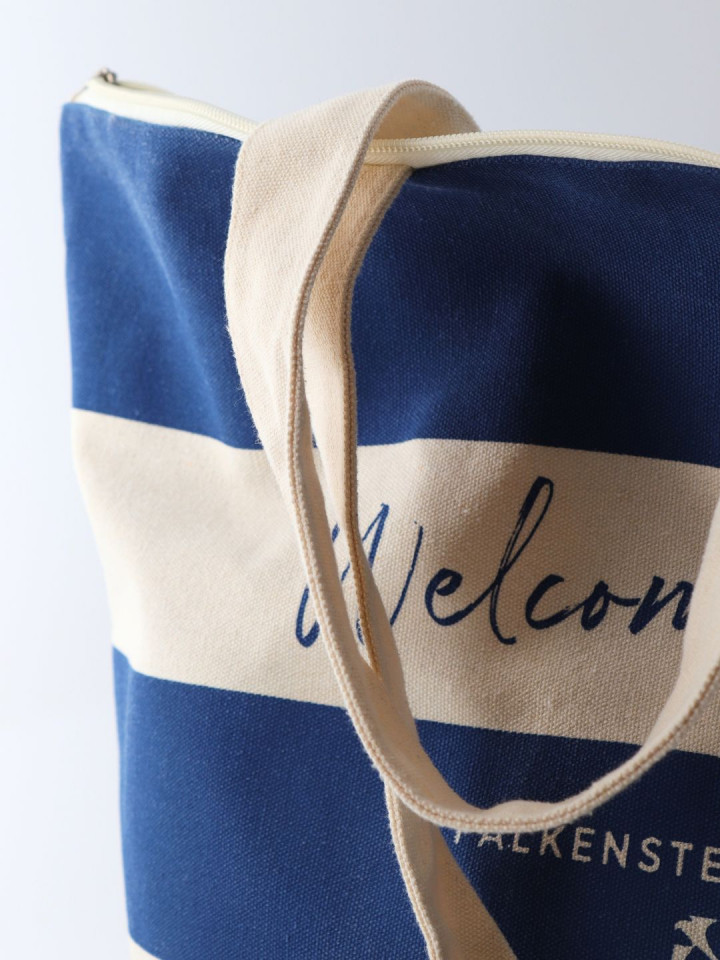 Spa bag for kids with flip-flops and bathrobe